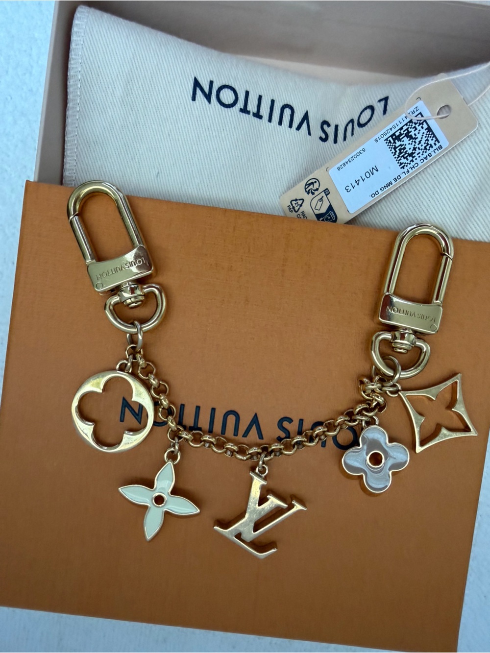 Louis Vuitton Gold-Tone Monogram purse Charm